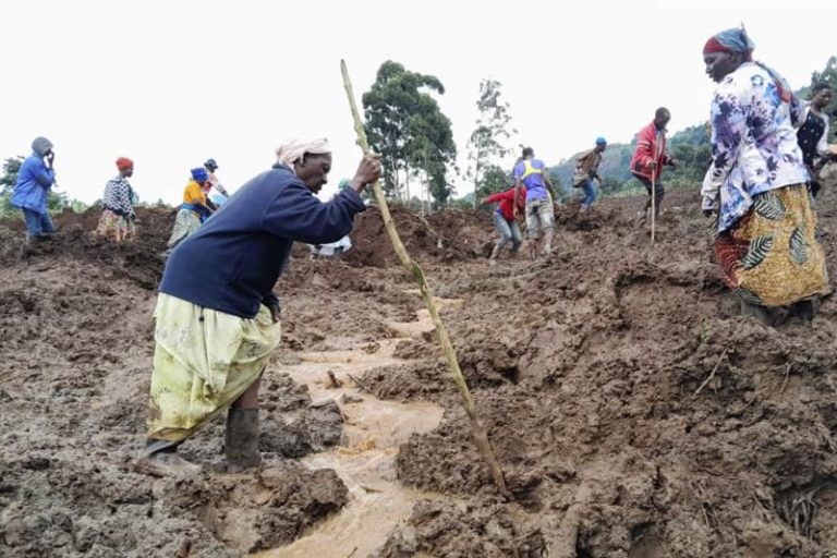 At least 15 killed and more than 100 missing after landslides bury homes in Uganda
