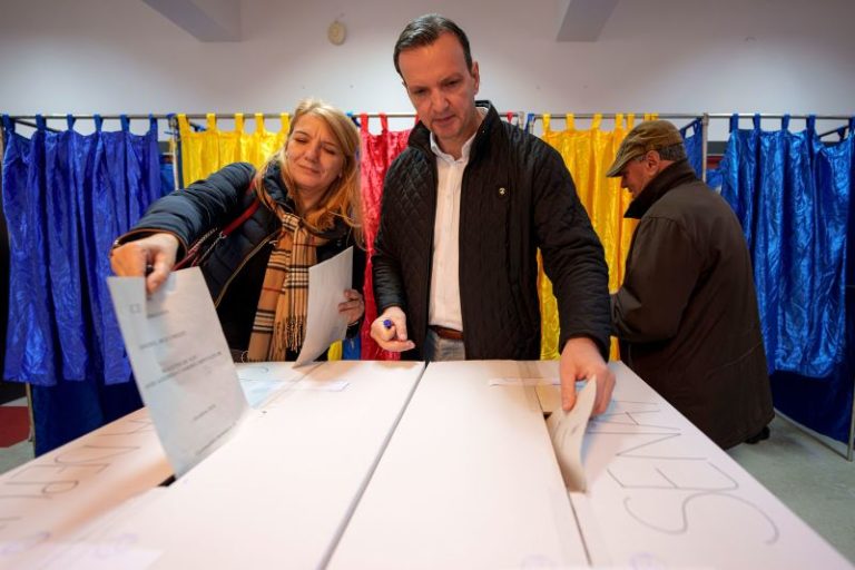 Romanians vote in parliamentary election amid turmoil over claims of Russian interference in presidential race